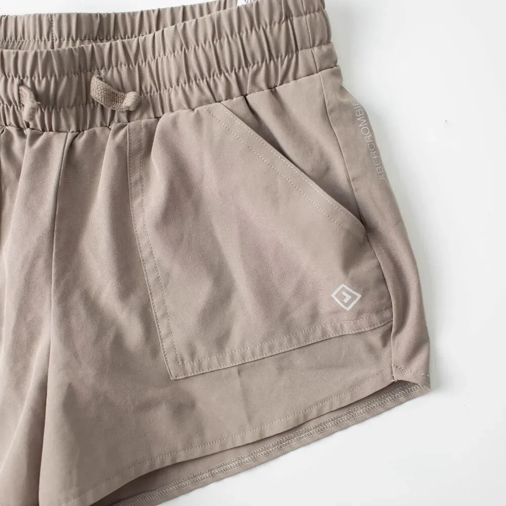 Abercrombie Kids YPB Girls 13/14 Beige Athletic Shorts Lightweight 4-Way Stretch
